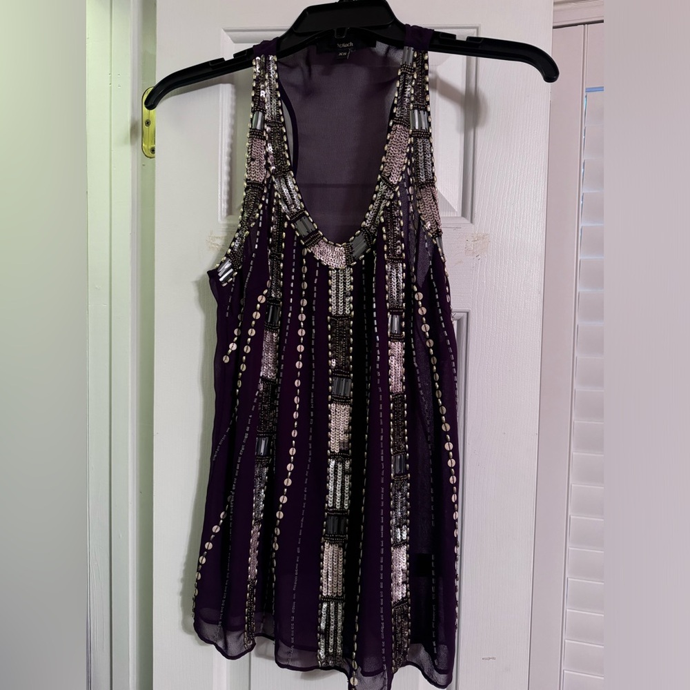 Cute black sequin top.